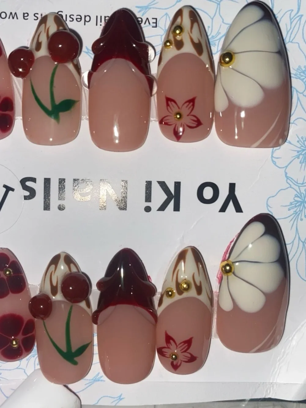 Handmade size mediumNude Floral Gel Press-On Nails with Burgundy & White Accents